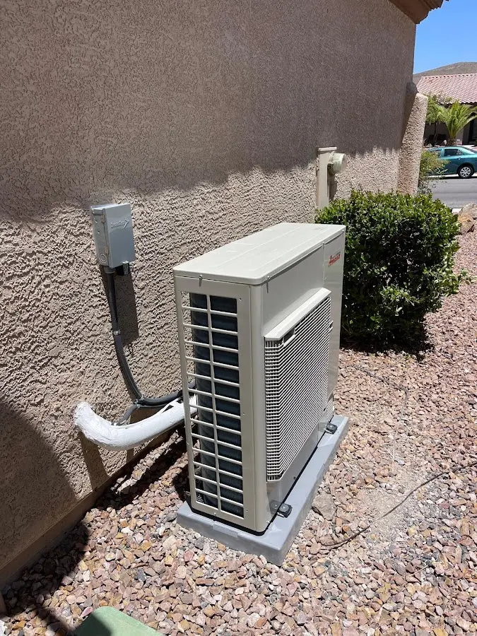 Residential air conditioning condenser unit in Carver